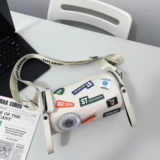 Unisex High-End Crossbody Bag – PU Cylinder Handbag with Brand Letter Badge, Buckle Closure & Golden Hardware