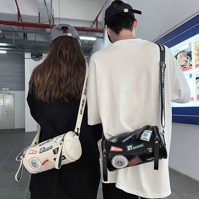 Unisex High-End Crossbody Bag – PU Cylinder Handbag with Brand Letter Badge, Buckle Closure & Golden Hardware
