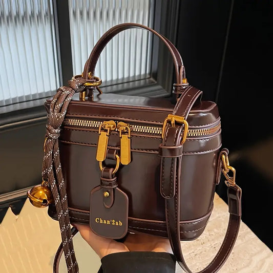 Elegant Vintage Women’s Crossbody Bag – Brown PU Leather Handbag with Bell Pendant, Adjustable Strap & Zipper Closure