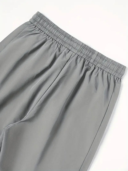 Men’s Sport Jogging Pants – Casual Loose Fit Polyester Trousers for Outdoor & Fitness Activities