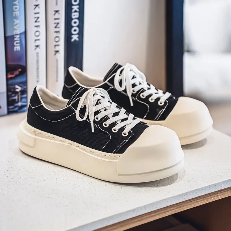 Unisex Low-Top Canvas Sneakers with Lace-Up Closure Cushioned Rubber Sole Black White Minimalist Design