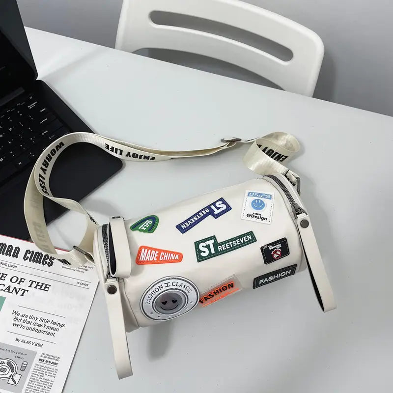 Unisex High-End Crossbody Bag – PU Cylinder Handbag with Brand Letter Badge, Buckle Closure & Golden Hardware