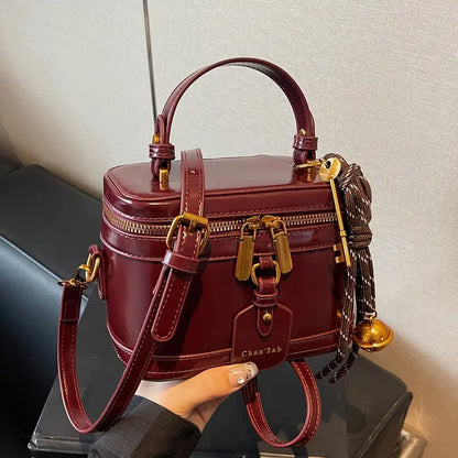 Elegant Vintage Women’s Crossbody Bag – Brown PU Leather Handbag with Bell Pendant, Adjustable Strap & Zipper Closure