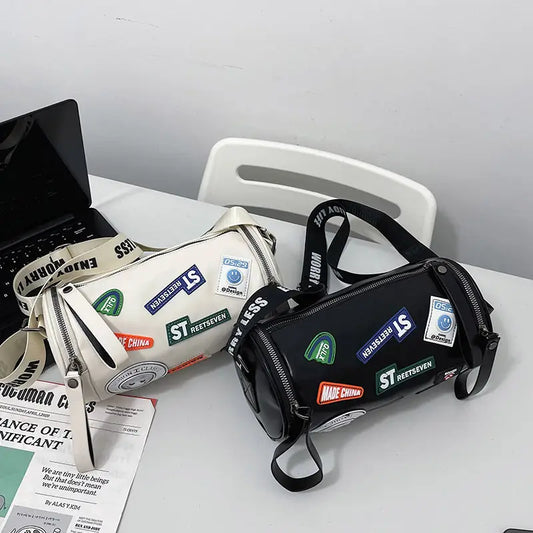 Unisex High-End Crossbody Bag – PU Cylinder Handbag with Brand Letter Badge, Buckle Closure & Golden Hardware