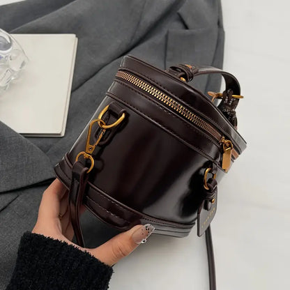Elegant Vintage Women’s Crossbody Bag – Brown PU Leather Handbag with Bell Pendant, Adjustable Strap & Zipper Closure